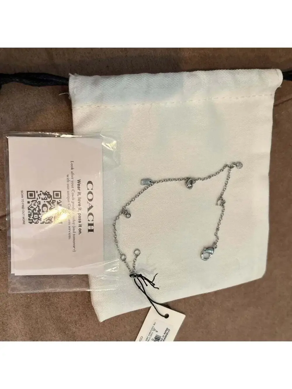 Coach Silver Tone Charm Bracelet with Heart and Logo Charms